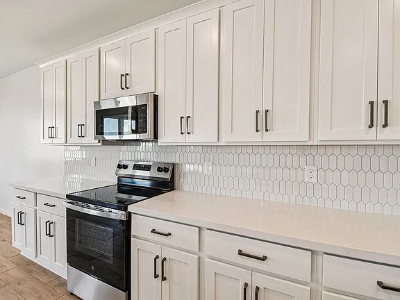 Harmony Collection finishes. Not actual home, finishes may vary by community.