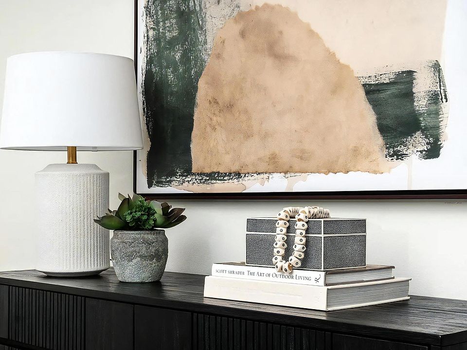Designer-Inspired Storage Cabinet with Table Lamp and Wall Art