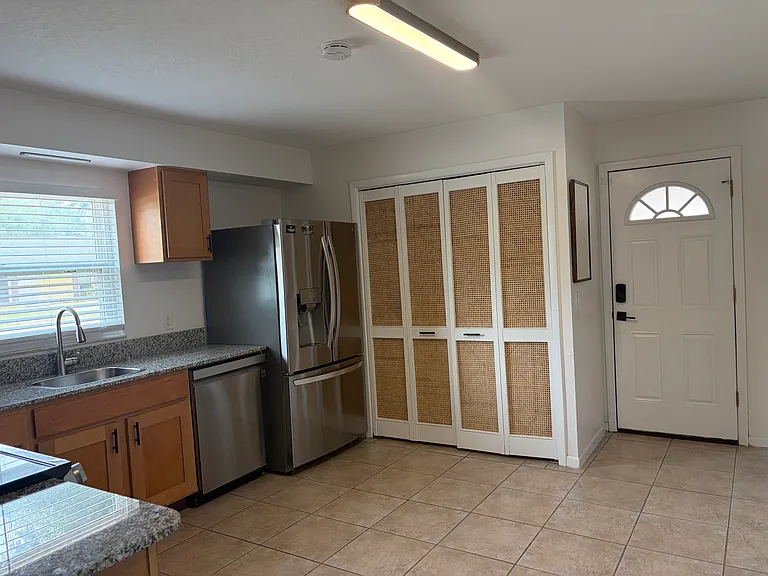Kitchen with in-unit W/D