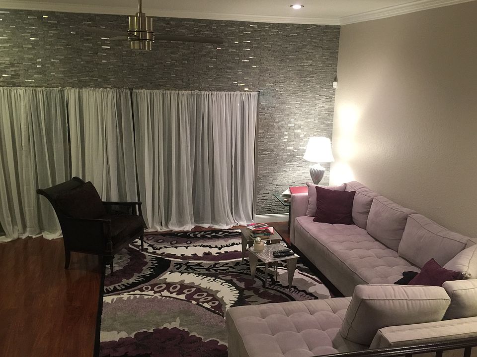Living Room w Stone Wall
