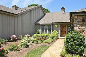 Entrance with professional landscaping