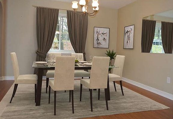 Formal Dining room with gleaming hardwood floors