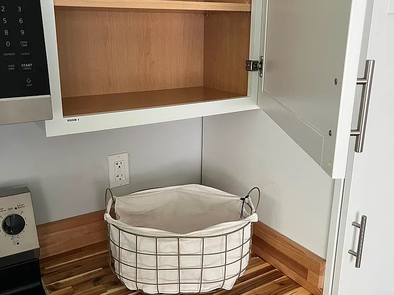 Labeled kitchen storage per room.