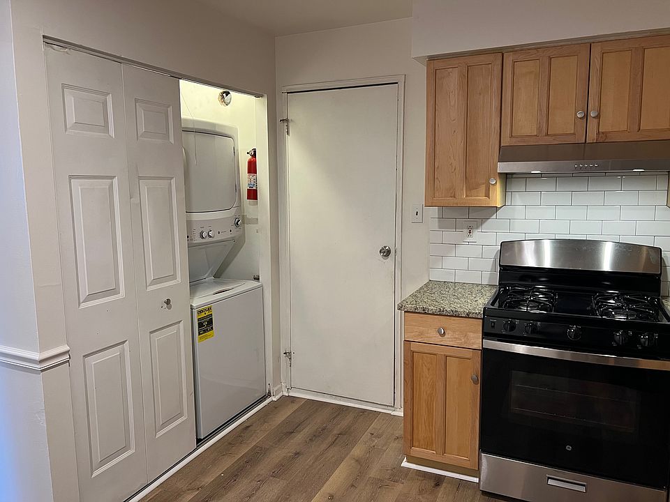Kitchen - all updated with in unit laundry with door to garage