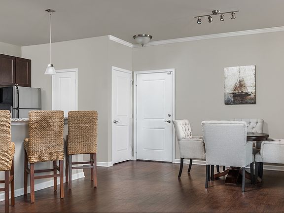 Open Dining Room with Hardwood Style Flooring