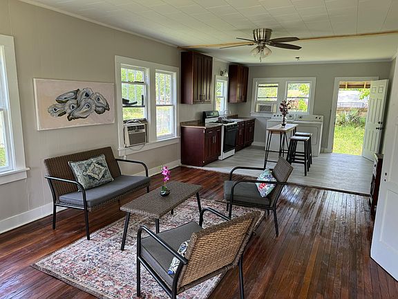 Open floor plan, newly refinished original hard wood floors.