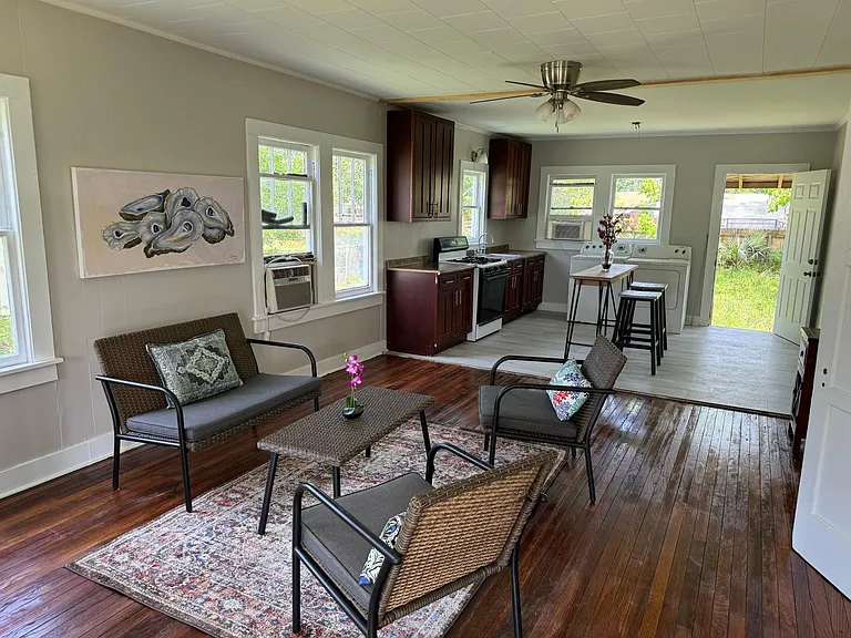Open floor plan, newly refinished original hard wood floors.