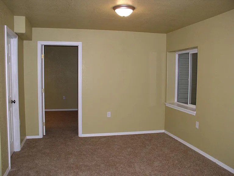 Basement Great Room, door to the 4th Bedroom