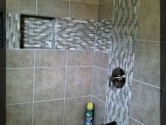 Bathroom decked out with Jacuzzi brand soaker tub and stylis
