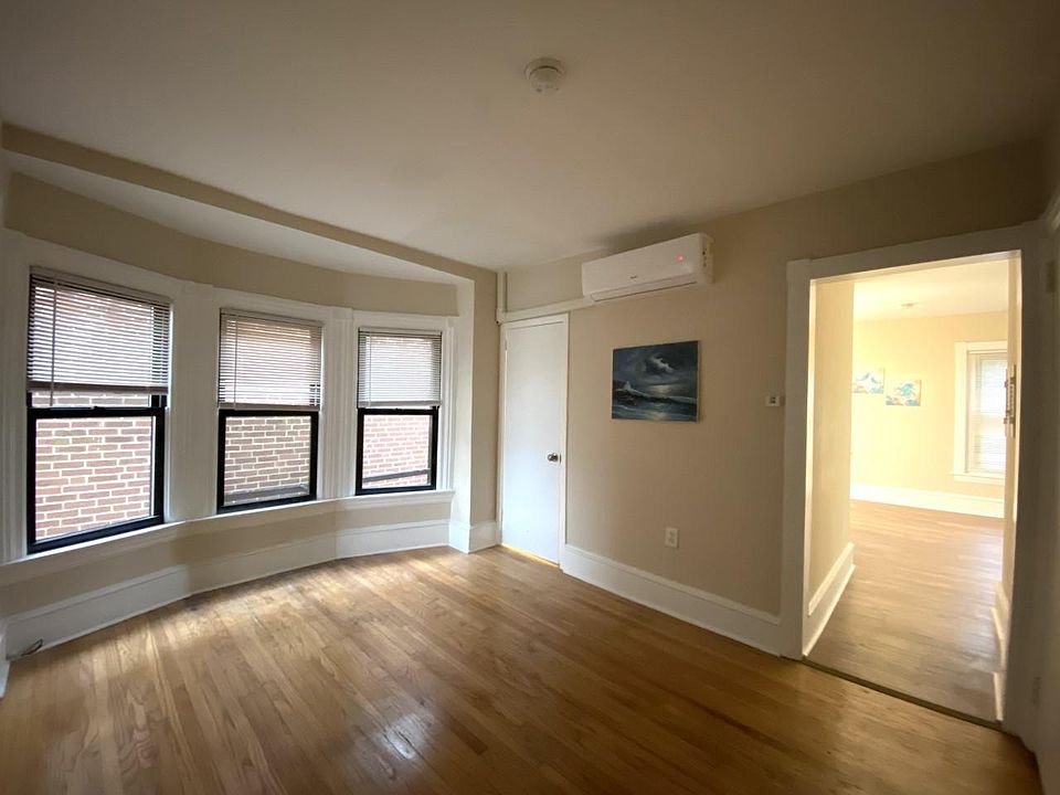 Living Room, the closed door is the bathroom