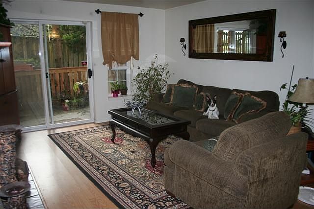 Great living space-designer colors and fireplace!