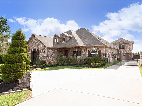 Enjoy the privacy of a gated side entry with attached/detached garage apartment & 8 foot privacy fenced backyard.