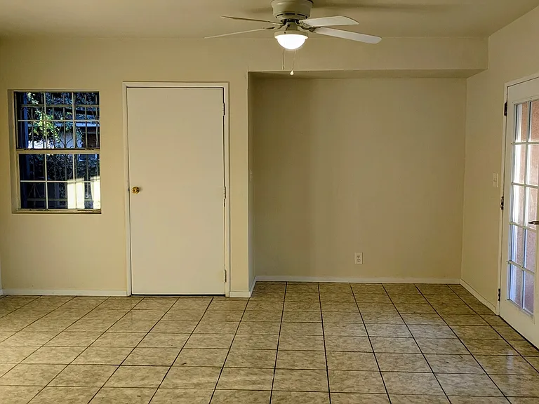 This is the living room which is adjacent to the kitchen in open style format.