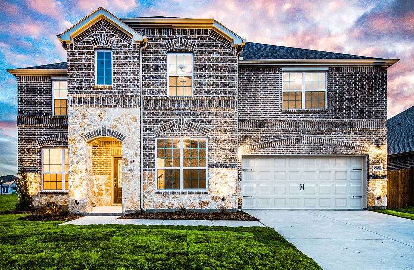 The Weston, a 2-story home with 2-car garage, shown with Home Exterior B