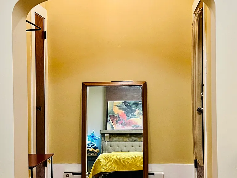 Changing room with coat rack, closet and emergency exit