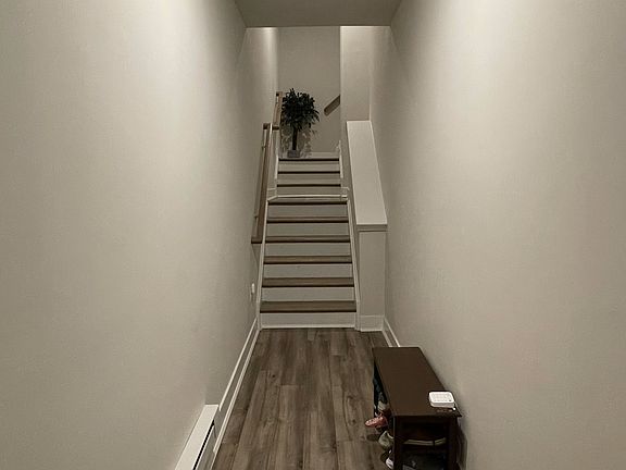 main private entrance hallway that leads to garage, private elevator and staircase to the unit.