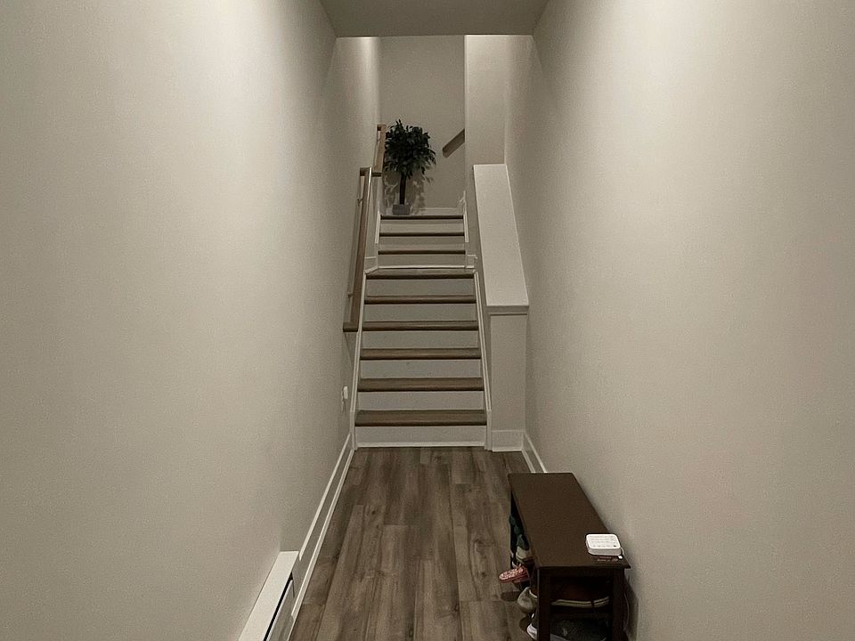 main private entrance hallway that leads to garage, private elevator and staircase to the unit.