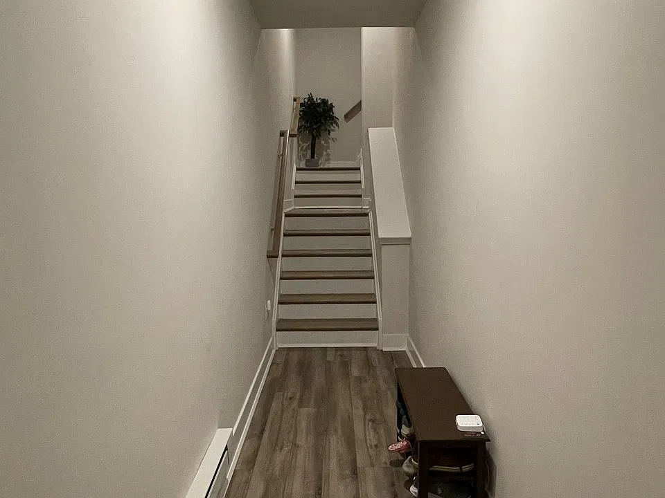 main private entrance hallway that leads to garage, private elevator and staircase to the unit.