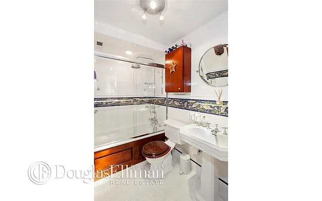 Sold by Douglas Elliman | media 18