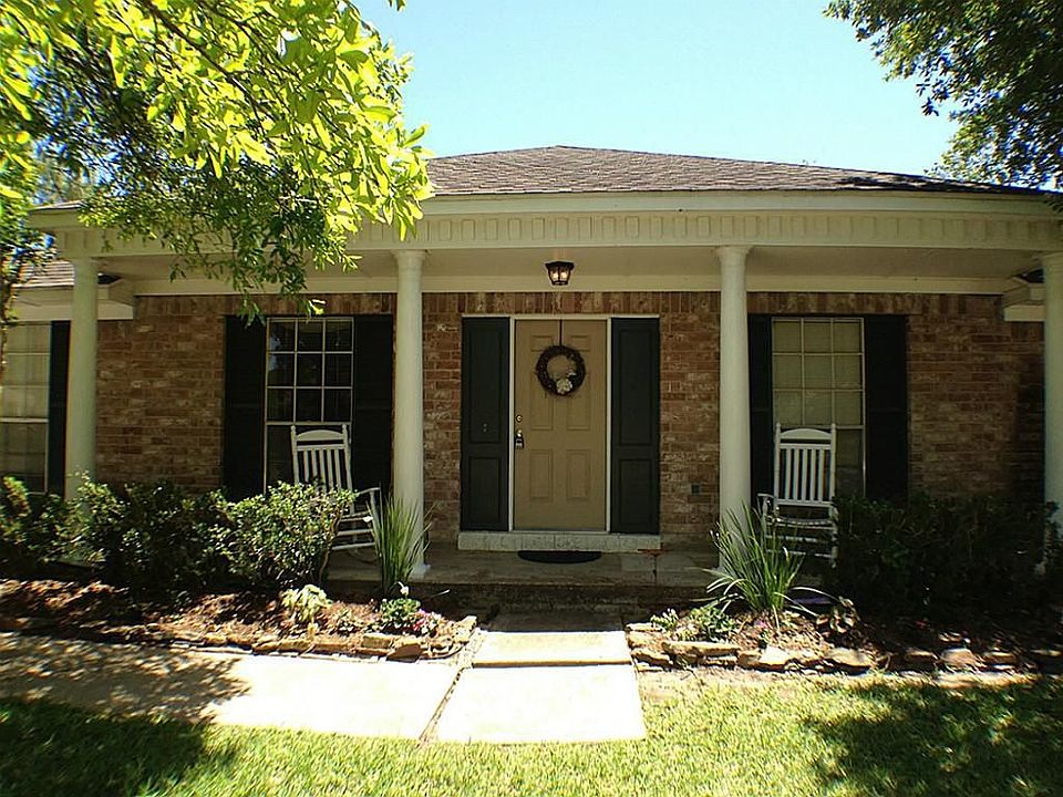 Front porch area has room for rocking chairs.