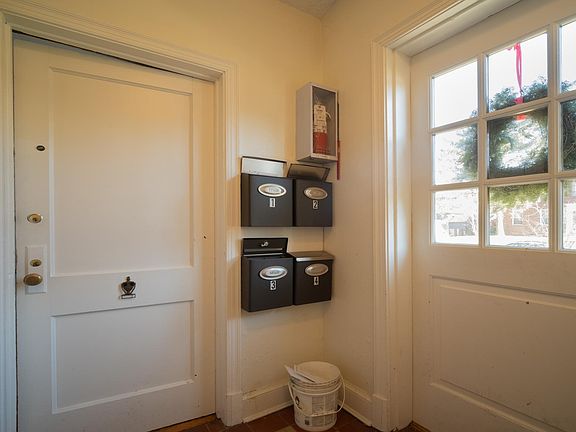 Front building entrance with mailboxes
