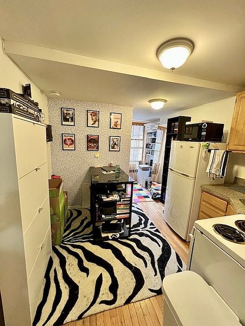 1st image of 310 E 6th St APT 23