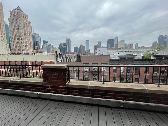 5th image of 407 W 51st St Penthouse A