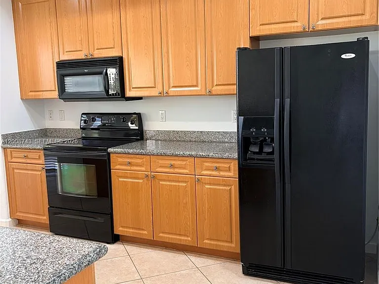7993 NW 128th Ln #13-B — Photo 4