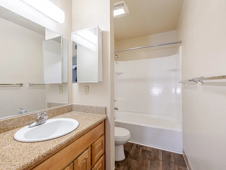 Bright and functional, Bathroom A offers a clean design with a full-size tub and generous vanity space.