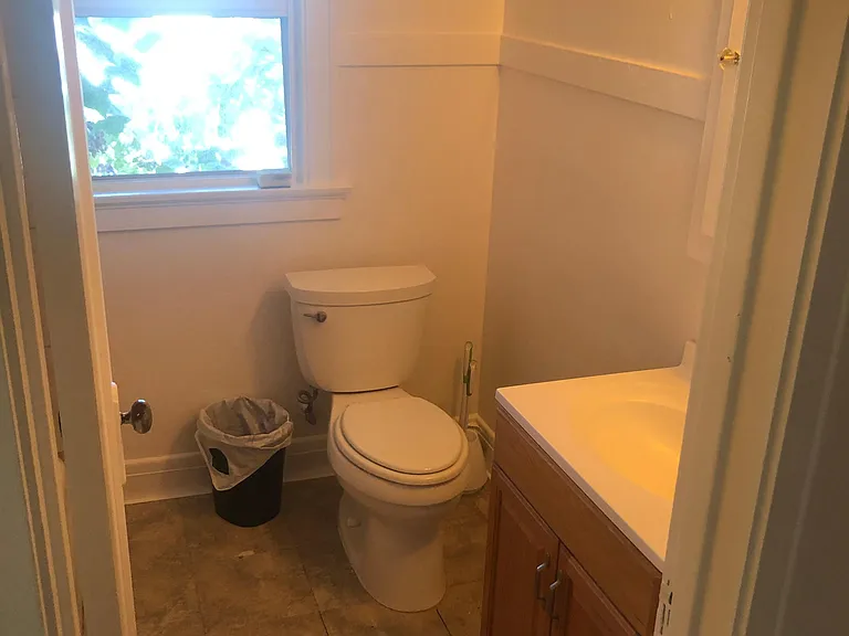 Bathroom with the bathtub shower combo