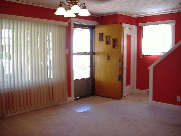 Picture Window with Vertical Blinds,Decorative Fireplace