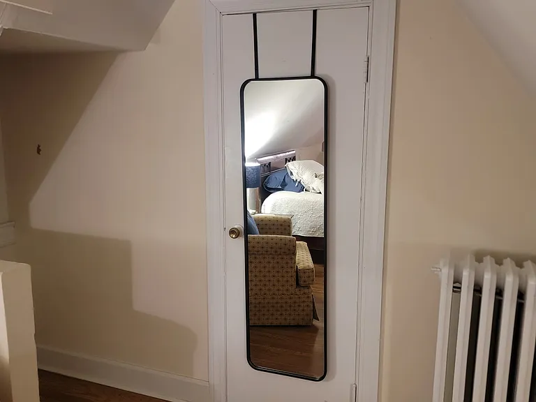 Upstairs third bedroom with two single beds