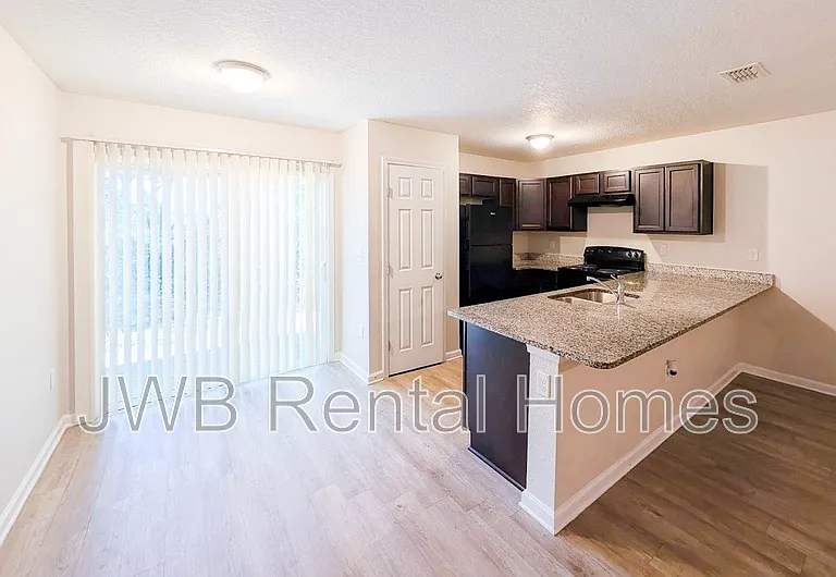 7844 Playschool Ln — Photo 2