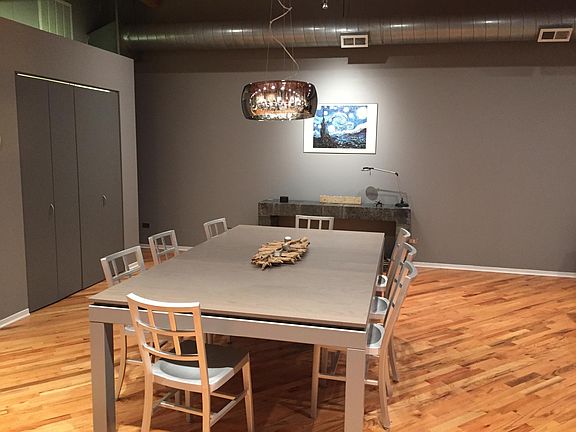 Dining area with cool modern chandelier