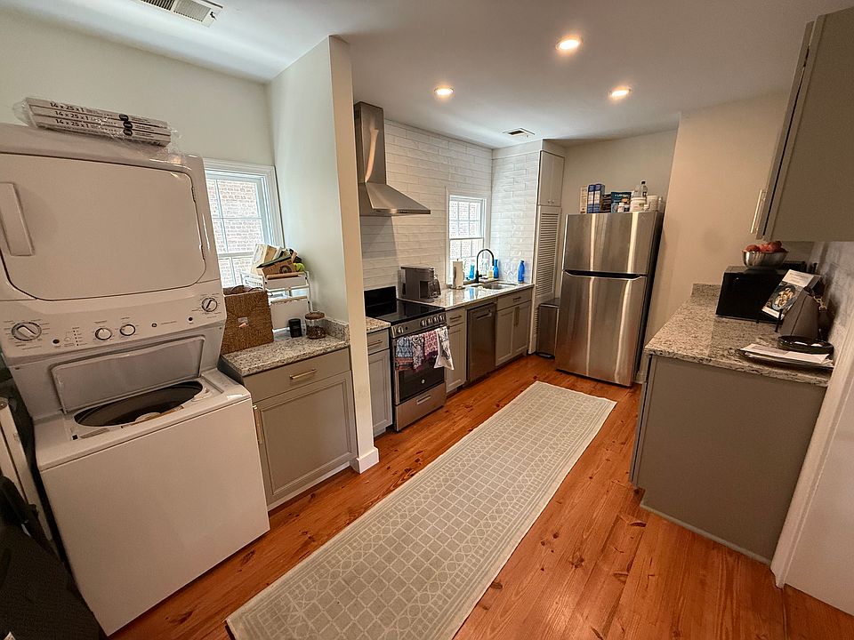 Updated kitchen with stainless steel appliances and in unit washer/dryer.