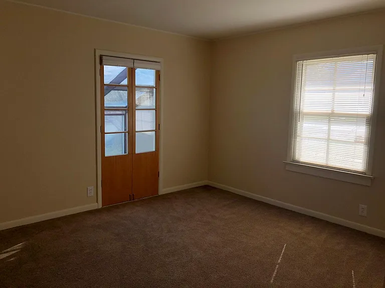 Master Bedroom with Door to Greenhouse