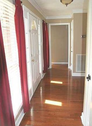 Foyer features wood floor and 2 closets