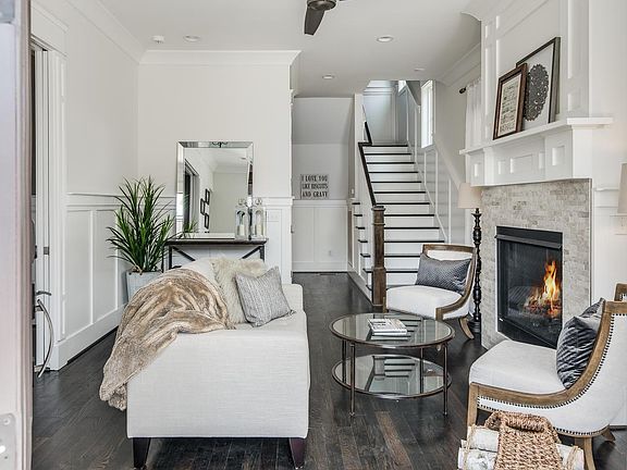 When you first enter the home there is a parlor area and fireplace.