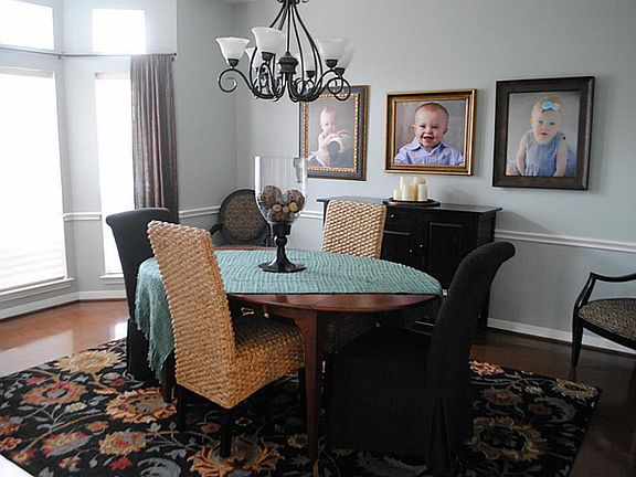 What a pleasure it will be to entertain in the formal dining room, with its gleaming wood floors and floor to ceiling bay windows.
