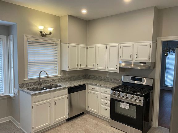 Kitchen (Picture 2) - All new appliances, counters, fixtures, lighting, and flooring!