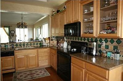 kitchen (tile black splash and granite counter tops)