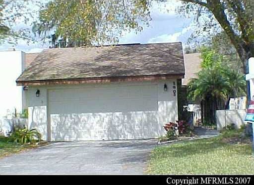 Private entry way with detached 2 car garage