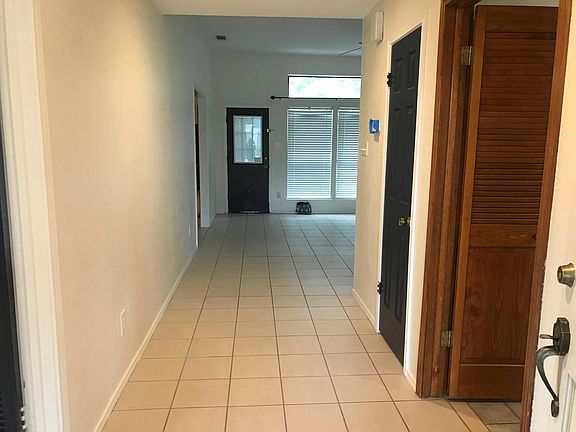 Entry with 4th bedroom or office to the right.