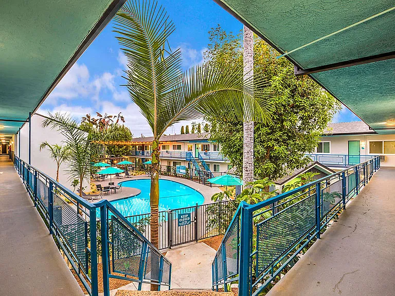 The Island Apartments view of pool from second floor walkway
