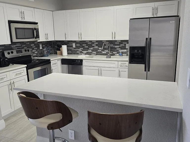 7580 Regency Lake Dr #402 — Photo 1
