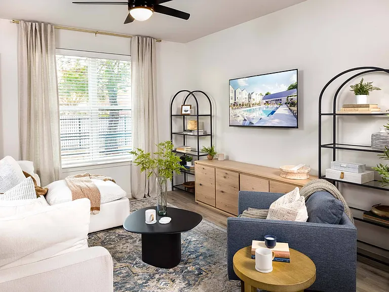 Natural light floods into your spacious living room, offering a warm and inviting atmosphere.