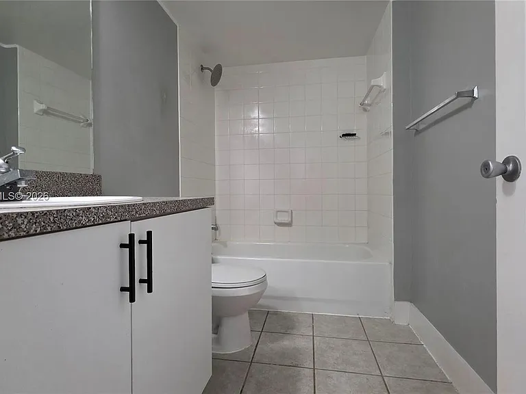 5011 Wiles Rd #203 — Photo 17