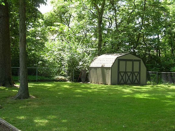Private large backyard. Mini barn