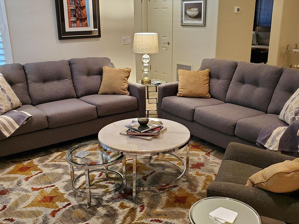 Roomy living area with two full size couches and chair!