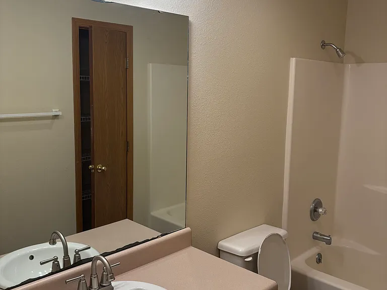 Guest bath with new sink, faucet, and light